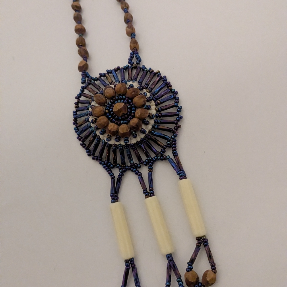 Handcrafted Beaded Necklace with Brown and Blue Accents